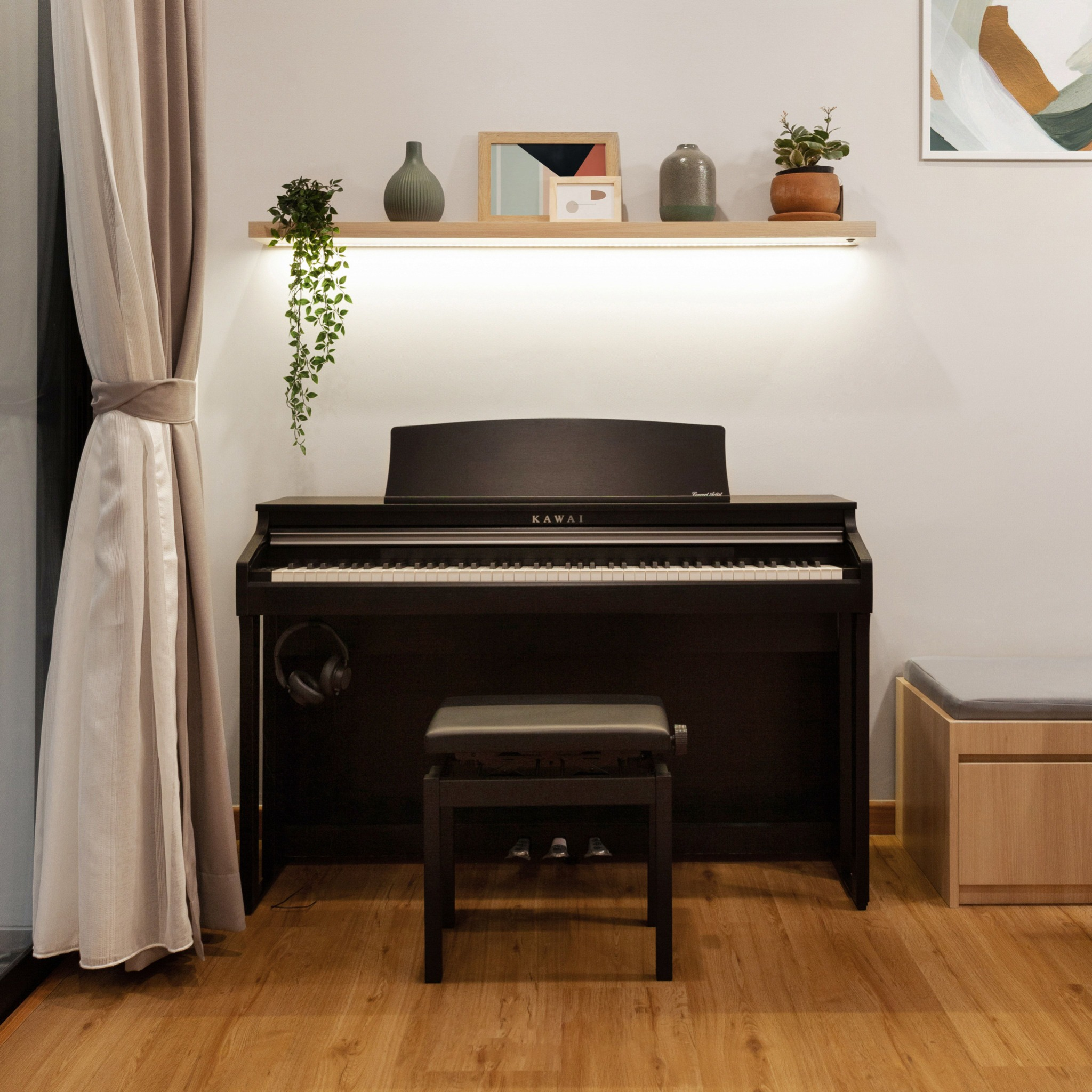 A compact digital piano and bench in a home